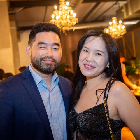 Two attendees are photographed at the Quebec Grand Finle, Place Gare Viger Montreal.
