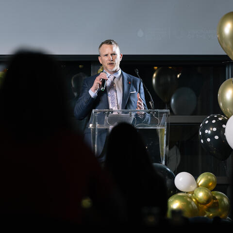 2025 Leadership Team Chair Dave McGee speaks from the stage at the Ontario Grand Finale, Steam Whistle Brewing Toronto. 