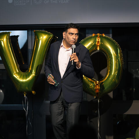 2025 Team Member of the Year Jatinder Wadhwa is pictured receiving his award on stage at the 2025 Ontario Grand Finale, Steam Whistle Brewing Toronto.