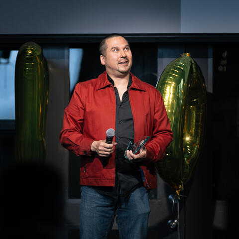 2025 Visionary Runner Up Adam Kimont is photographed receiving his award at the Ontario Grand Finale, Steam Whistle Brewing Toronto.