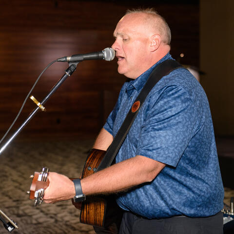 Musician Glenn Gordon performs at the Atlantic Grand Finale, Steele Wheels Auto Museum in Halifax.